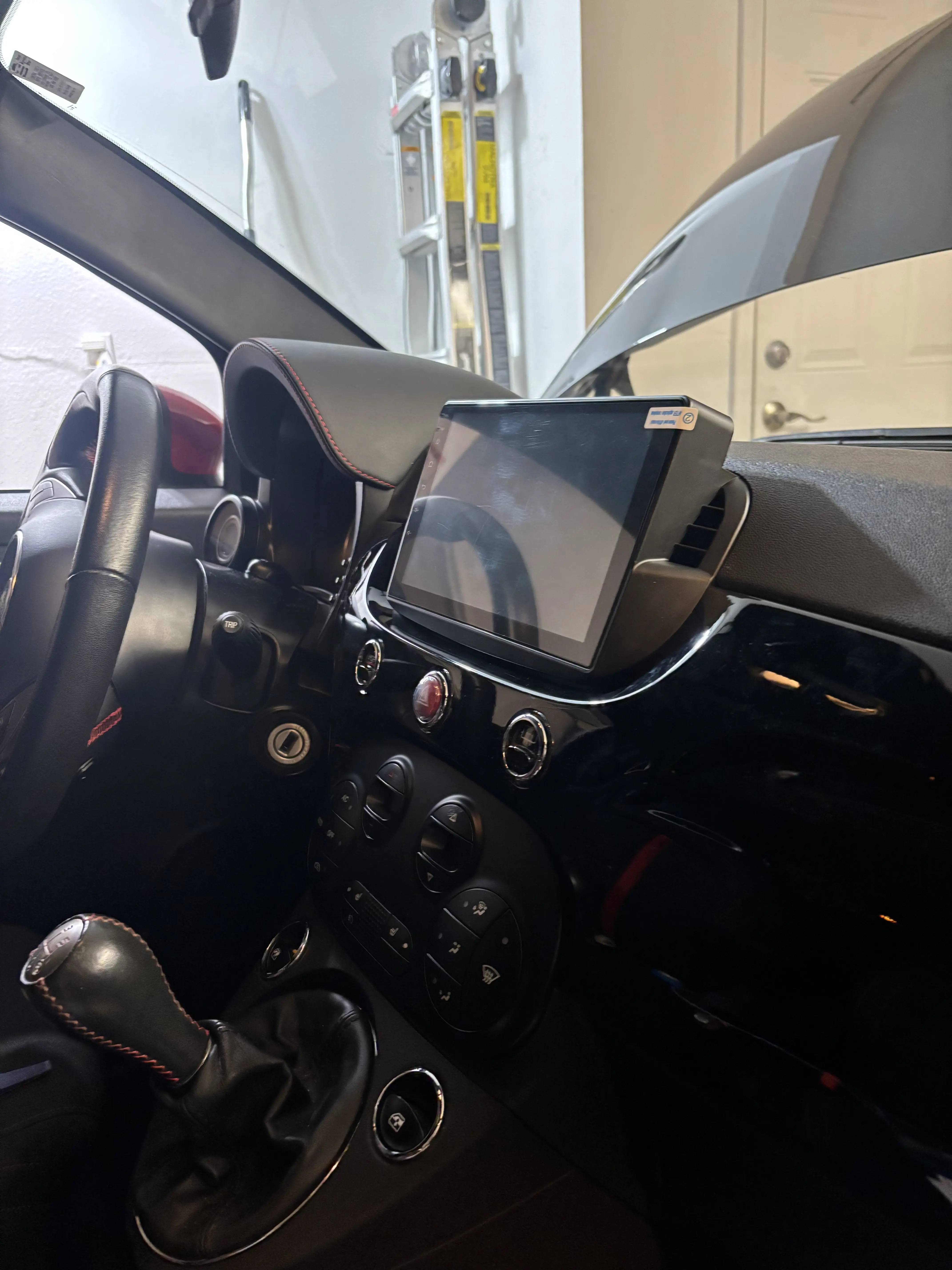 Sound deadening material applied to car interior
